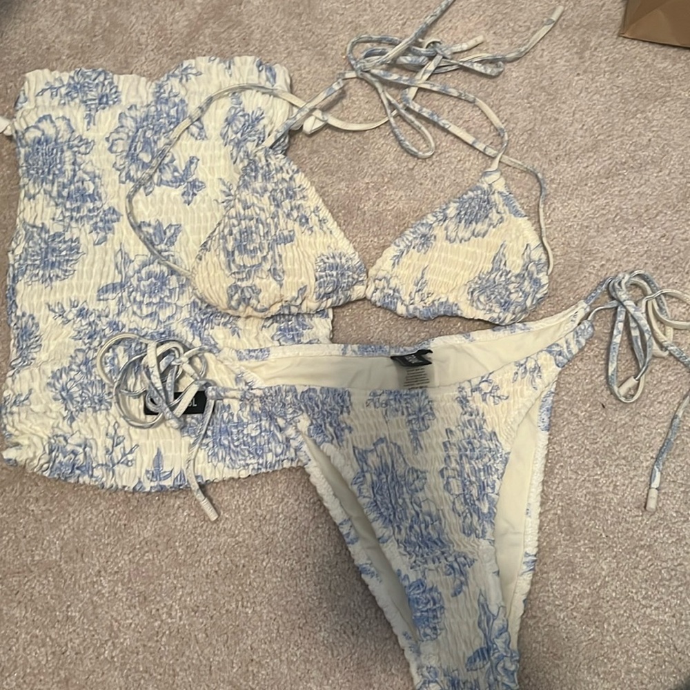 Triangl two piece bikini. large top, medium bottom